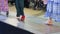 Catwalk shoes, beautiful female legs in high heels on fashion show, stylish footwear on women feets