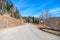 Caucas Mountains. Bend in the road with roadsign