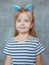 Caucasian adorable cute sweet little girl with long blonde hair in cat`s ears