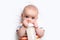 Caucasian baby boy with baby milk bottle.