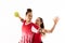 Caucasian and biracial young female handball players defeating against white background