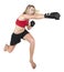 Caucasian blonde woman kickboxing