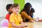 Caucasian boy ethnicity kid smiling white learning in classroom