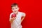 Caucasian boy kid child schoolboy apple gives in front red in his hands