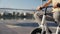 Caucasian boys having fun riding children bicycle in park. Happy boy having fun on balance bike while his brother is