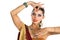 Caucasian brunette woman in brown indian national dress sari