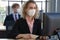 Caucasian businesspeople with medical mask for coronavirus covid-19 protection working in office