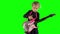 Caucasian child playing toy guitar