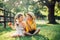 Caucasian children boy and girl siblings sitting together sharing apple