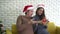 Caucasian couple celebrating Christmas selfie and surprise gift