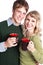 Caucasian couple holding coffee cups