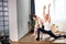 Caucasian couple keep balance in yoga pose