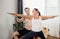 Caucasian couple keep balance in yoga pose