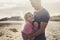 Caucasian couple in love and romantic scene inside an old vintage camper ready to travel and have a vacation together with