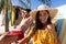 Caucasian couple  sitting on deck chairs at the beach