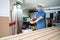 Caucasian craftsman blowing the tools to clean them