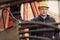 Caucasian engineer at work at container yard and cargo with containers forklift