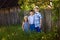 Caucasian everyday children in the village. Three children portrait together in the summer.