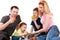 Caucasian family with children eating apples