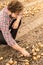 Caucasian farmer in plaid shirt control onion field