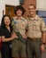 Caucasian father, Korean mother and teenage Amerasian son before a ceremony for Eagle Scout recognition in Edmond, Oklahoma.