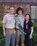 Caucasian father, Korean mother and teenage Amerasian son before a ceremony for Eagle Scout recognition in Edmond, Oklahoma.
