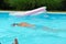 Caucasian female swimmer doing laps in a pool