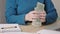 caucasian female woman hands counting paper American dollar money, calculator