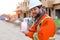 Caucasian foreman giving disinfectant soap at construction site.