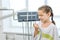 Caucasian girl examines dental equipment in clinic. Visiting dentist with children.