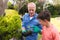 Caucasian grandfather and grandson spending time together in the garden, planting