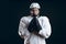 Caucasian hockey player, in uniform, isolated on black, prays for good luck.