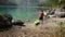 Caucasian kayaker on the scenic lake shore
