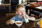 Caucasian kid having breakfast alone