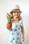 Caucasian Little Girl in Hat Hold Juicy Mini Pineapple Hands