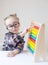 Caucasian little girl with round glasses