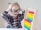 Caucasian little girl with round glasses