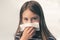 Caucasian little girl to blow her nose with hygienic wet wipe. Seasonal sickness. child sneezes into a rag. sneeze cough