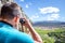Caucasian male through binoculars at Montagu Springs valley