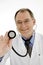 Caucasian male doctor or nurse wearing a lab coat with a stethoscope