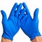 Caucasian male hands in blue latex gloves.