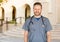 Caucasian Male Nurse In Front Of Hospital Building