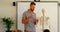 Caucasian male teacher explaining skeleton model in classroom at school 4k