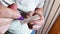 Caucasian man doing an antigen test for coronavirus. The stage where the reagent is dripped on the test to determine the