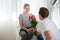 Caucasian man give rose to girlfriend cerebate valentine day