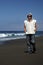 Caucasian man with glasses on the beach