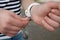 Caucasian man in handcuffs and key, criminal concept