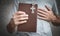 Caucasian man holding bible and christian cross. Religion