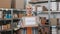 Caucasian man holding donation box among food bank