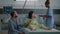 Caucasian man and woman expecting child in hospital ward